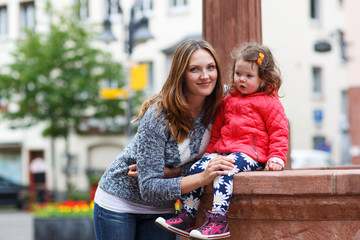 mother and little daughter having fun together