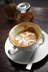 close up hot latte in white cup