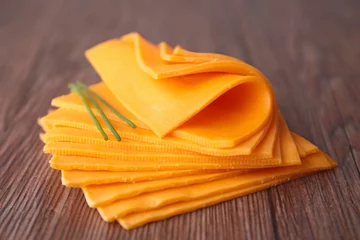 Foto op Plexiglas sliced cheese © M.studio