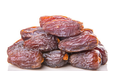 Date fruits over white background