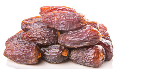 Date fruits over white background