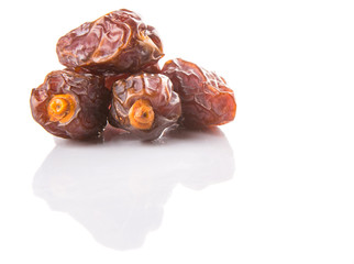 Date fruits over white background