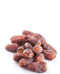 Date fruits over white background