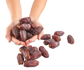 Female hands with date fruits over white background