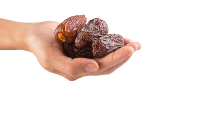 Female hands with date fruits over white background