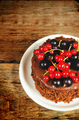 chocolate cake mini with red and black currants