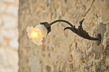 street lamp in medieval italian village