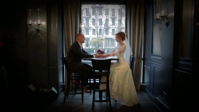 Wedding couple in a prestigious restaurant