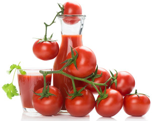 Bottle and glass of tomato juice and tomatoes