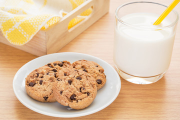 Chocolate chip cookies and milk .