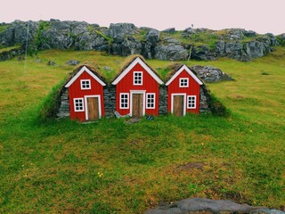 Fototapeta na wymiar Red little toy houses at Egilsstadir, Iceland