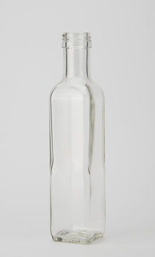 Empty bottle on light grey background