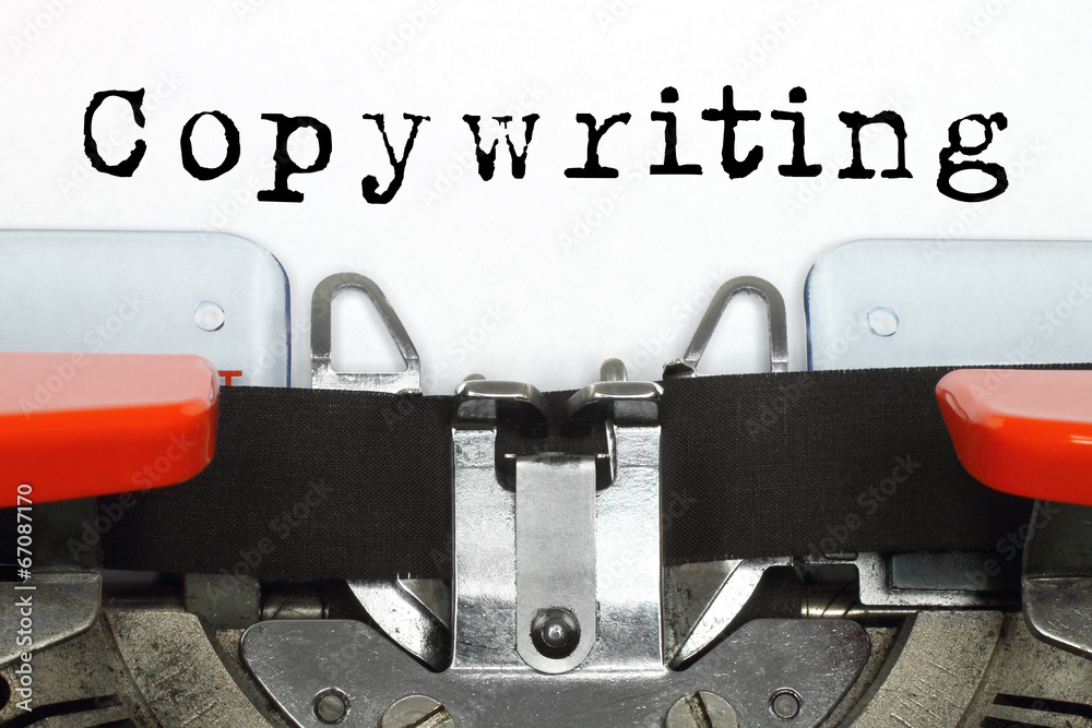 Fototapete part of typing machine with typed copywriting word