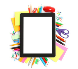 Tablet PC with school office supplies on white background . - obrazy, fototapety, plakaty