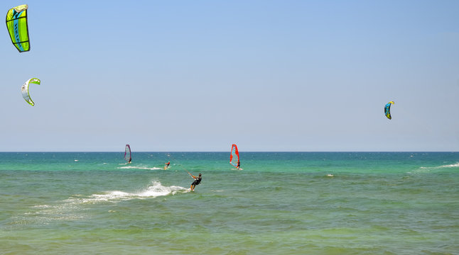 kite surfer cutting through the waves