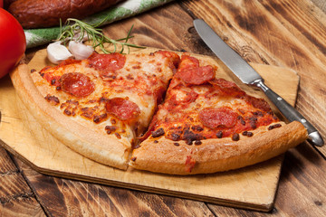 Two pieces of pizza.