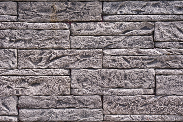 Black and white slabs imitation stone on wall