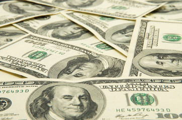 One hundred dollars pile.