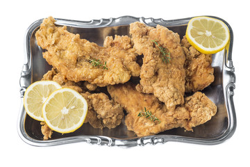 Pork schnitzel with thyme and lemon