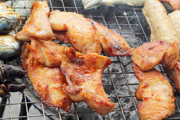 A lot of pork on the grill