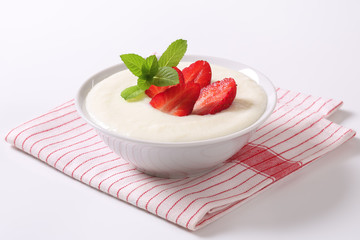 Milk pudding with strawberries