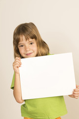 Little girl carrying a poster