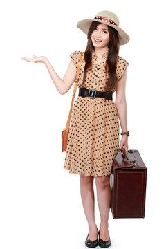 woman with suitcase presenting