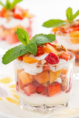 dessert with fresh strawberries, apricots, whipped cream