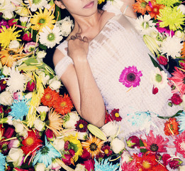fashion model posing with flowers