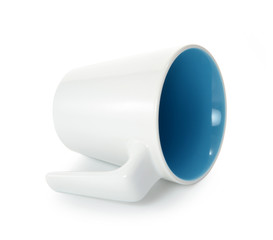 White ceramic mug. Isolated on a white.