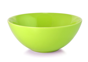 Green empty bowl isolated on white