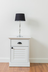 Lamp on bedside table