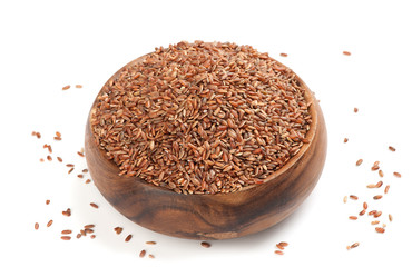 long-grain red rice on white background