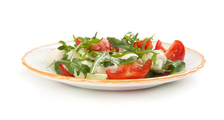 salad from arugula tomatoes and mozzarella