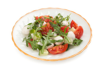 salad from arugula tomatoes and mozzarella