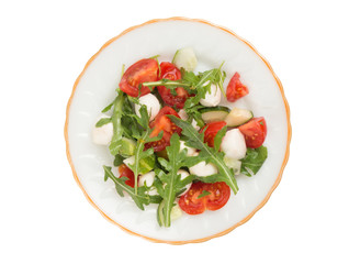 salad from arugula tomatoes and mozzarella