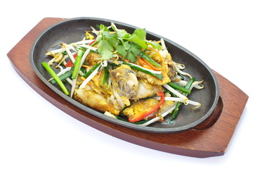 fried mussel pancakes and vegetables in hot plate