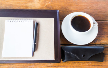 Obraz na płótnie Canvas Simple work table with cup of coffee
