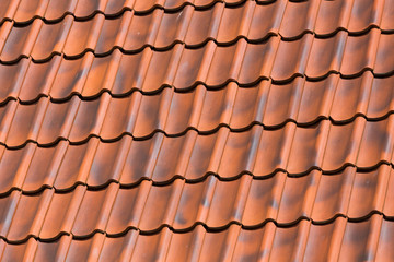 Red tiles roof background