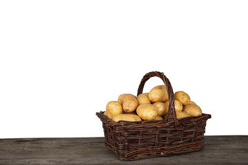 Wicker-basket with fresh harvested raw potatoes