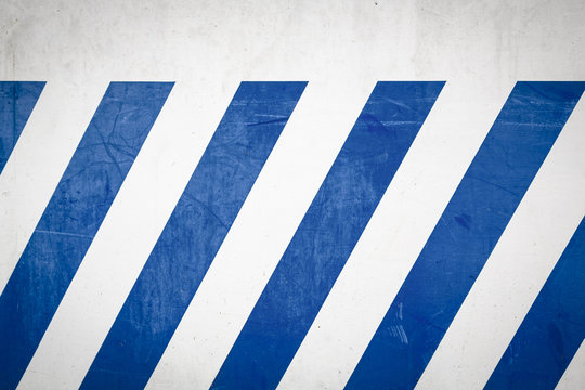 Blue Diagonal Stripes On A White Wall