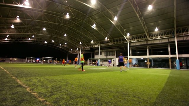 THAILAND, KOH SAMUI, FEBRUARY 2, 2014: men playing soccer on the