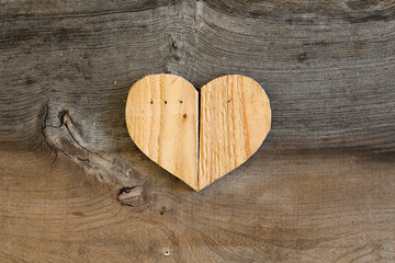 Love Valentines wooden heart on old Elm background