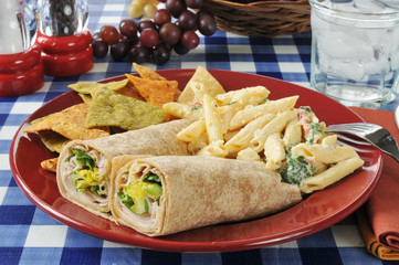 Chicken wrap sandwiches with pasta salad