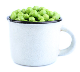 Fresh green peas in mug isolated on white background