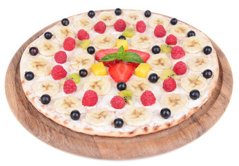 Sweet pizza with fruits isolated on white