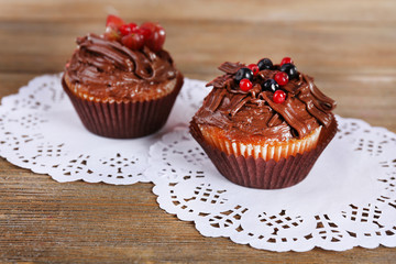 Tasty cupcakes on table, close up