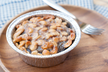 Close up image of walnut toffee cake