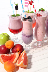 Delicious milkshakes on table, close-up