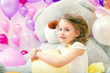 Obraz na płótnie Canvas Image of beautiful little model posing in playroom